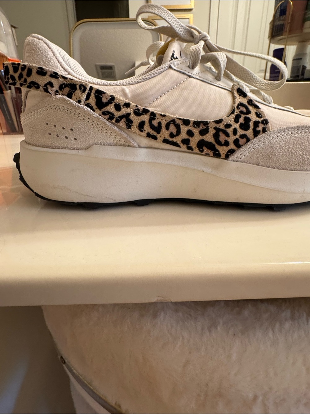 Nike Women’s White Sneakers with Leopard Swoosh Accent